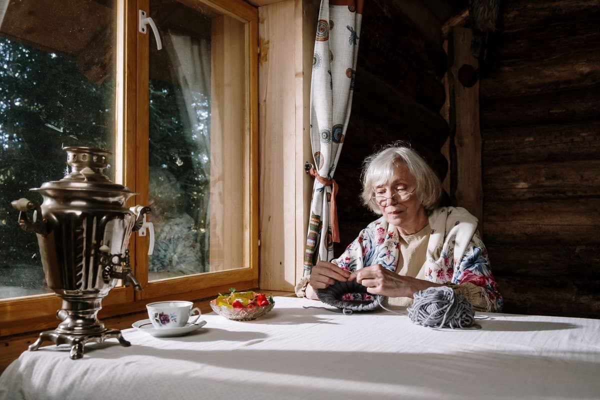A person doing close-up needlework