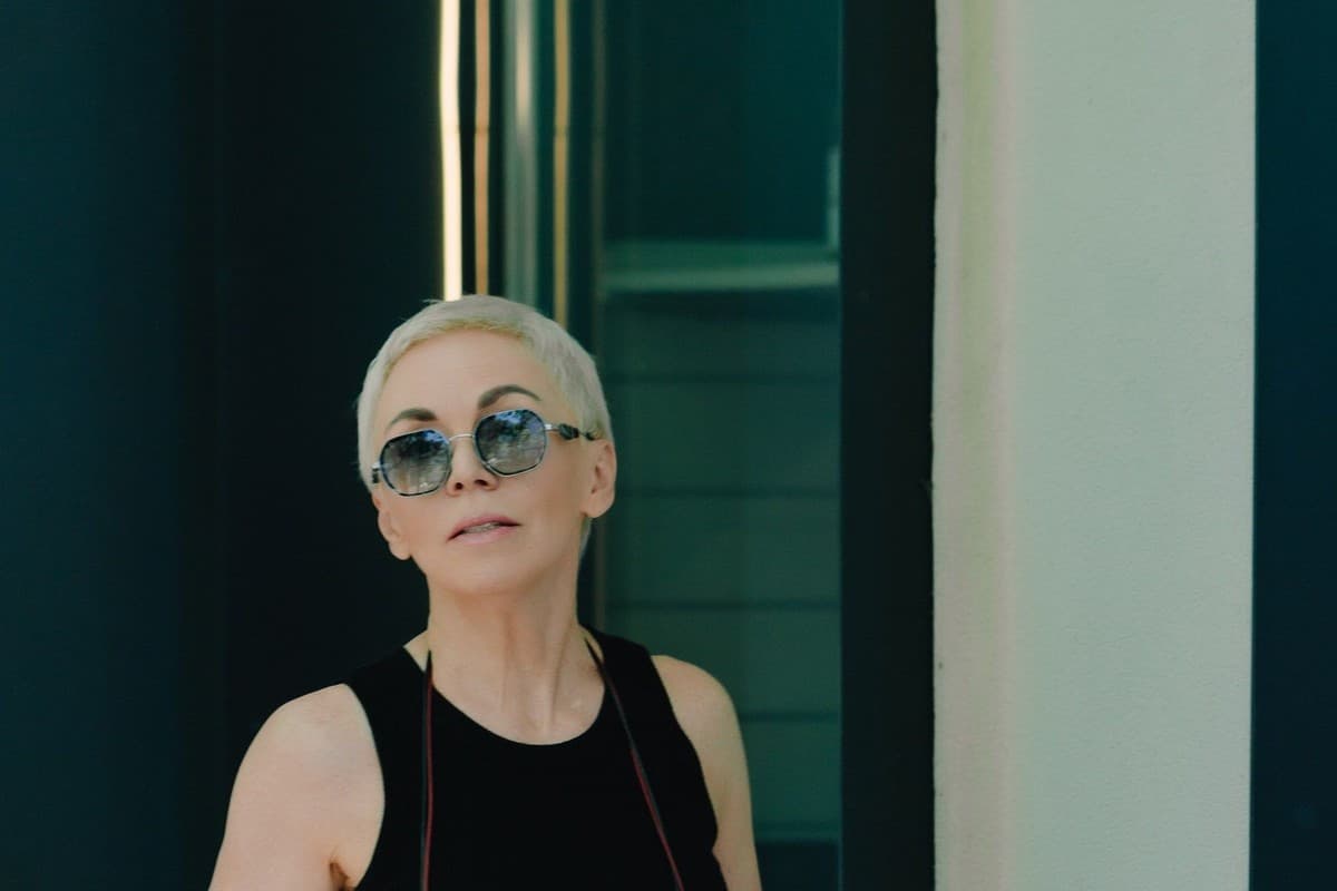 A person wearing sunglasses in everyday life